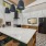 large countertop with stools in clubhouse kitchen