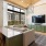 tv viewing area next to large windows