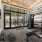 roomy fitness center with bright windows