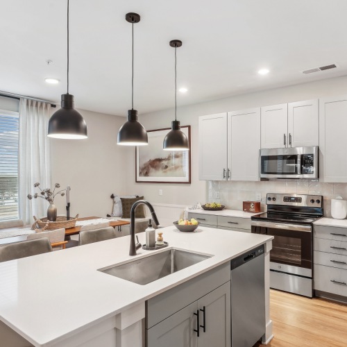 Brand New Apartments  kitchen with large island at Knoll at Briar Chapel